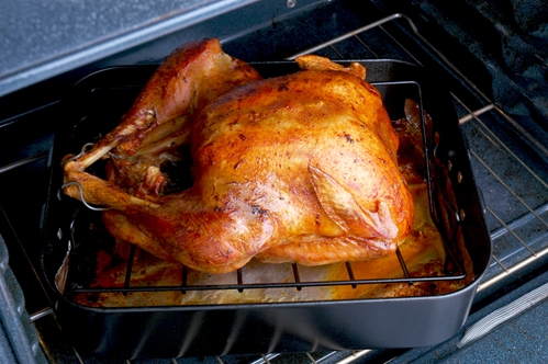 Grilling turkey outside is a common cooking method for Thanksgiving revelers.