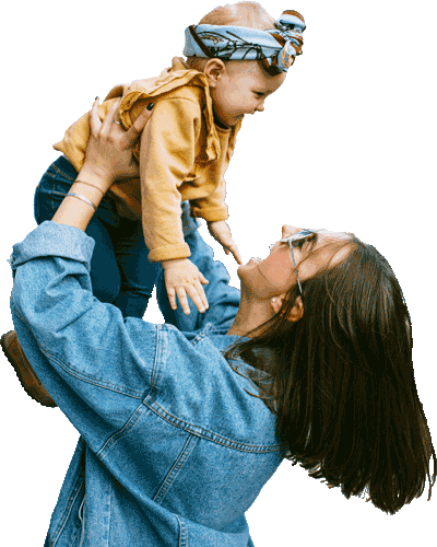 Mother Playing With Her Baby Outdoors