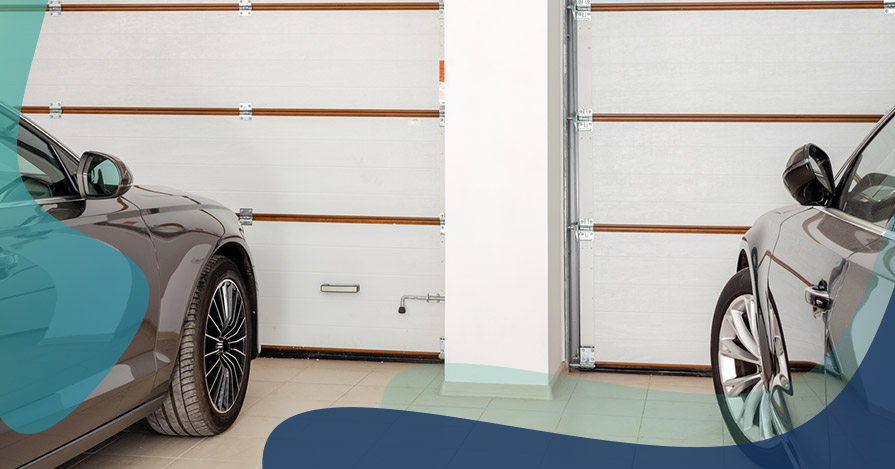 two cars in a garage looking for ways to save money when you own more than once car